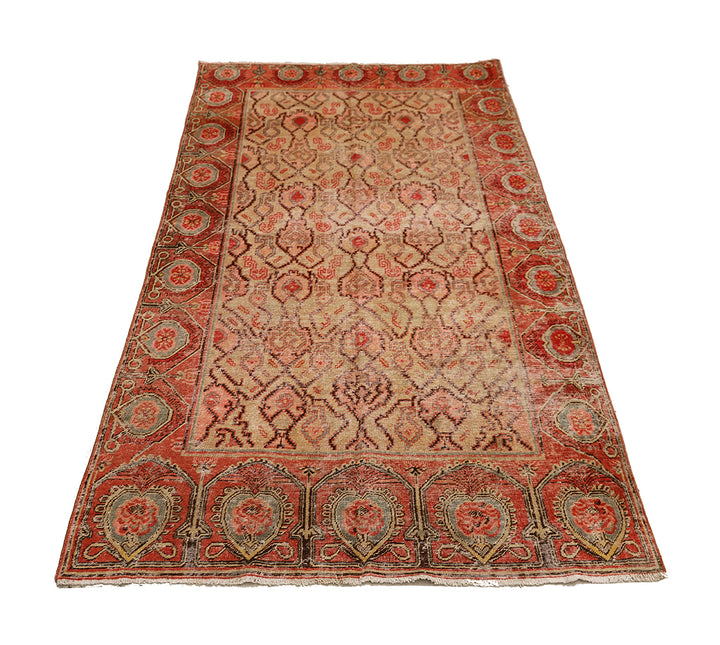 Decorative rug with intricate patterns on a white background