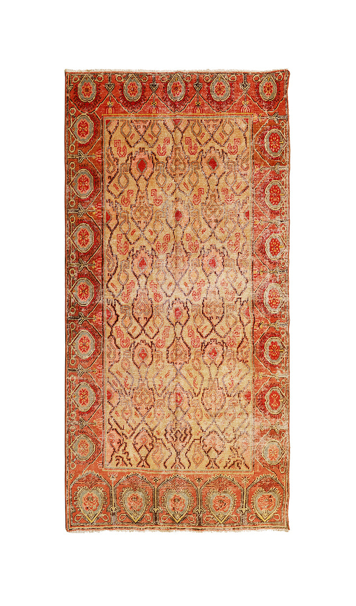 Decorative rug with intricate patterns on a white background