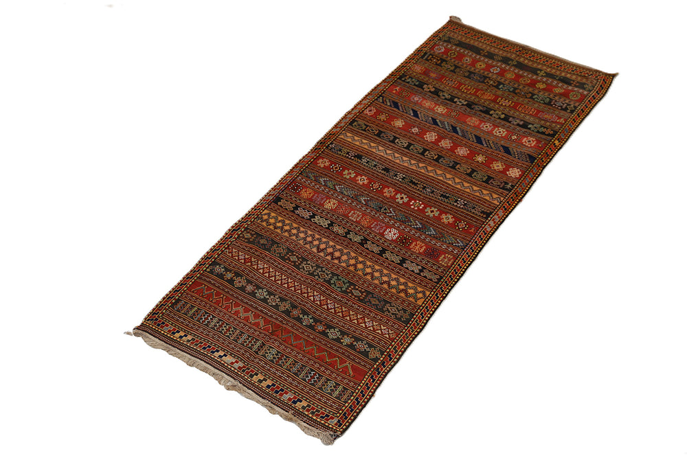 Decorative rug with intricate patterns on a white background