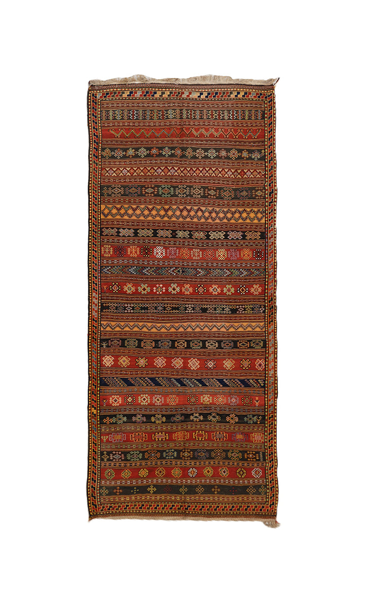 Traditional patterned rug on a white background