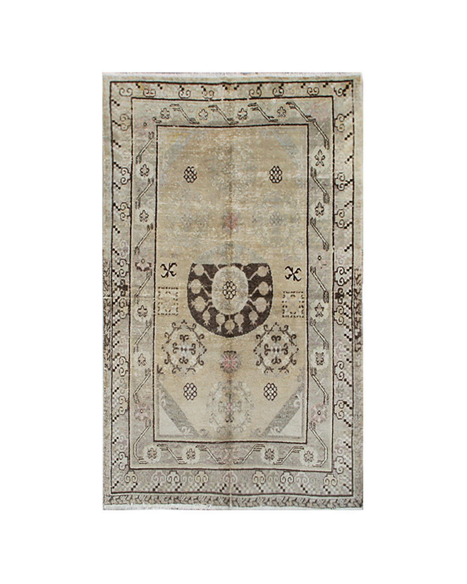 Decorative rug with intricate patterns on a white background