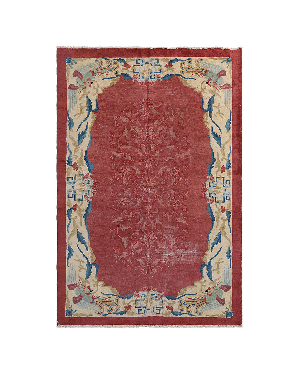 Decorative rug with intricate patterns on a white background