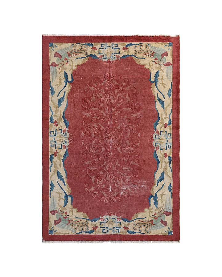 Decorative rug with intricate patterns on a white background