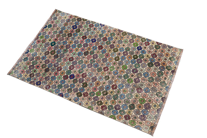 Patterned rug with multicolor hexagonal design on a white background