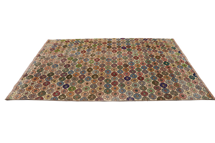 Multicolored patterned rug on a white background
