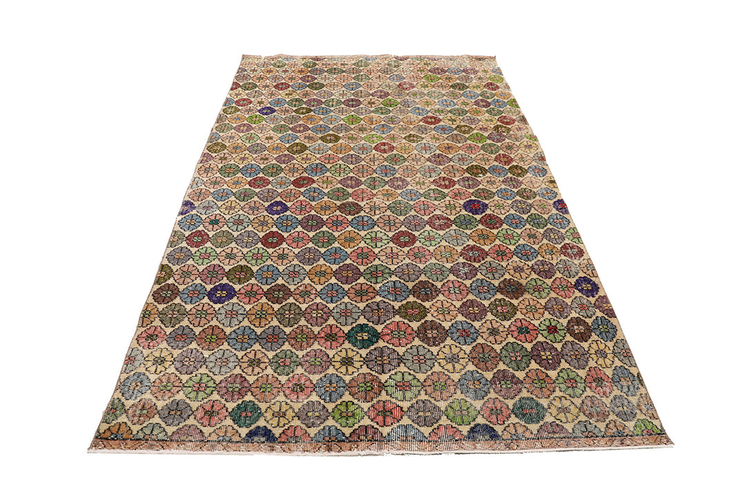 Multicolored patterned rug on a white background
