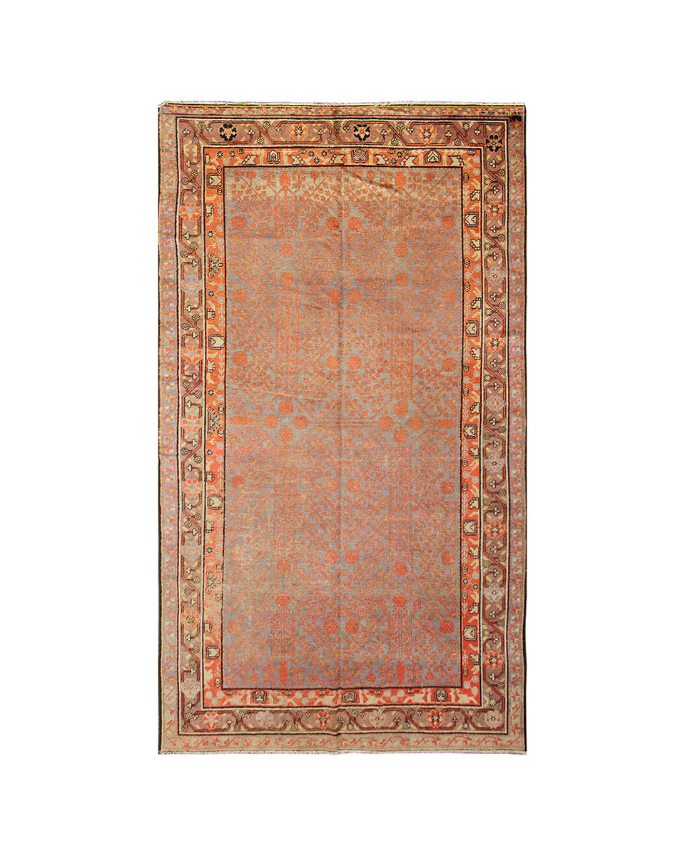 Decorative rug with intricate patterns on a white background