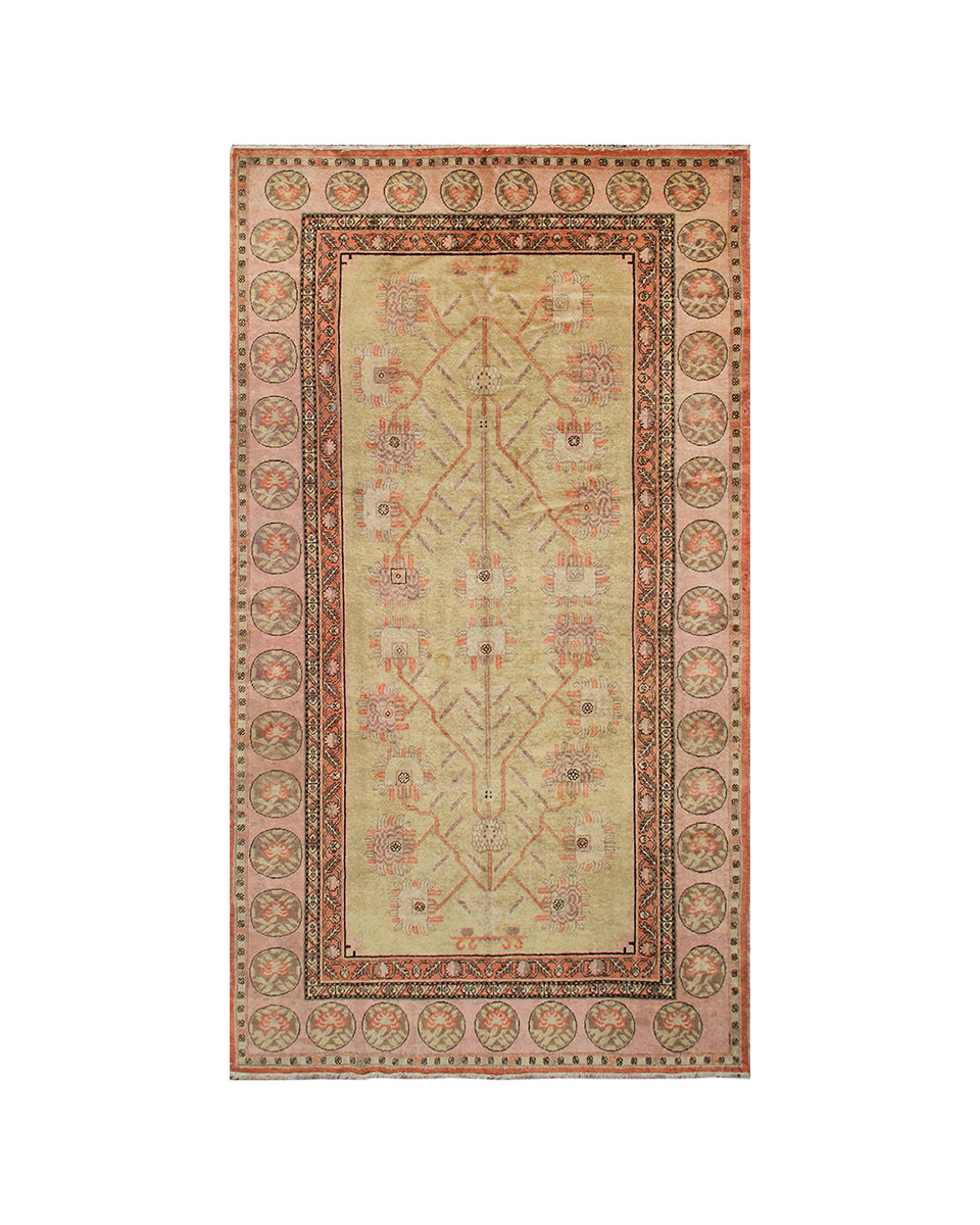 Decorative rug with intricate patterns on a beige background