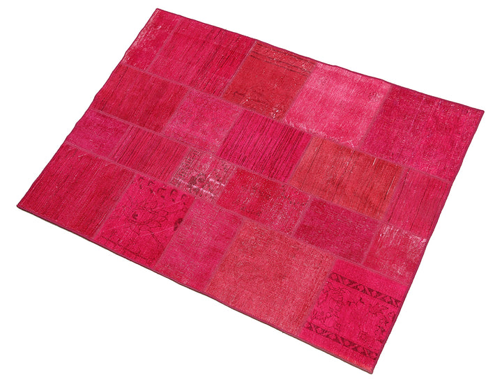 Red patchwork rug on a white background
