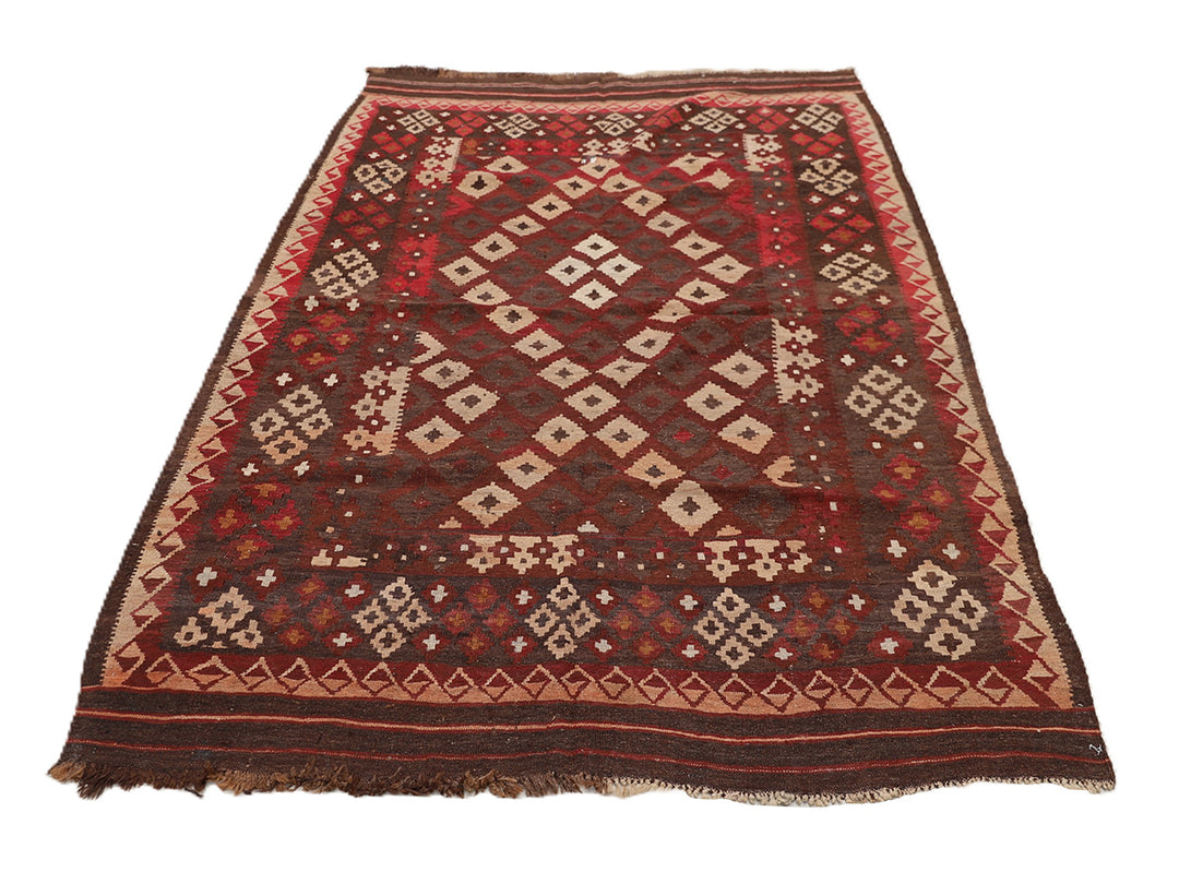 Traditional patterned rug on a white background