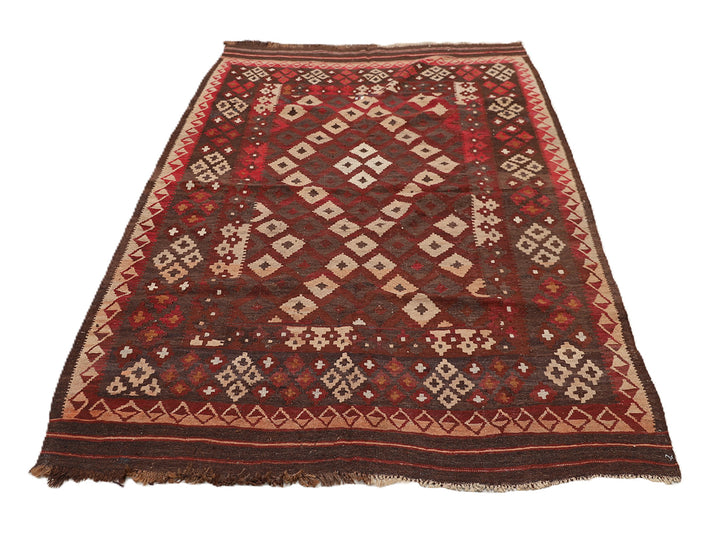 Traditional patterned rug on a white background