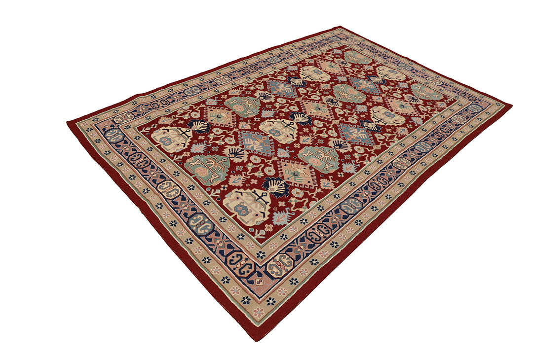 Decorative rug with intricate patterns on a white background