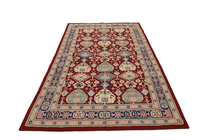 Decorative rug with intricate patterns on a white background