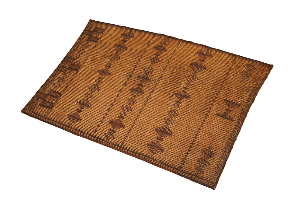 Bamboo mat with a geometric pattern on a white background