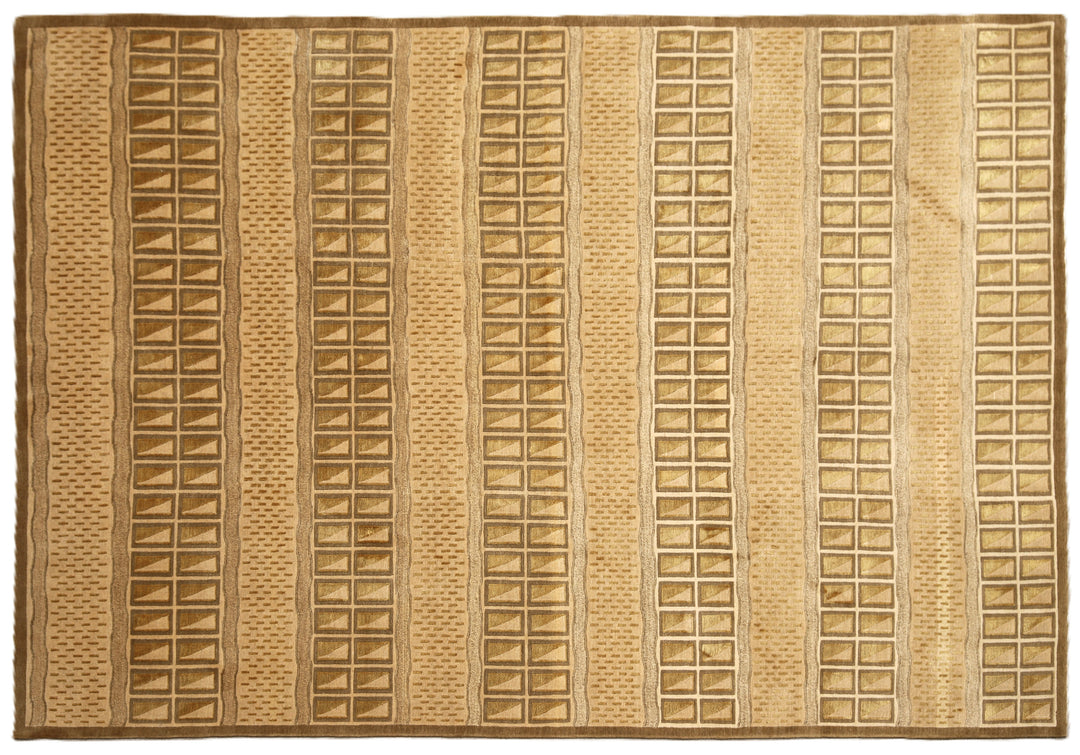 6x9 hand-knotted modern Tibetan wool and silk linear rug in gold and green featuring a plush cut pile with hand-carved geometric lines