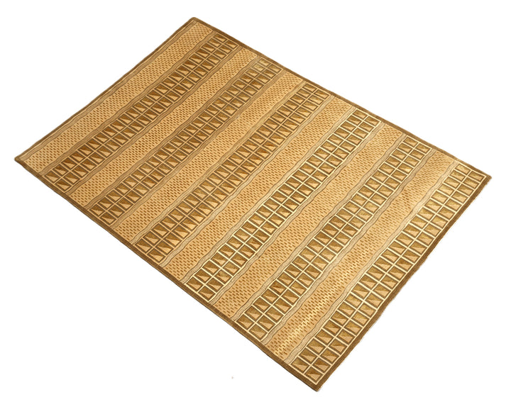 6x9 hand-knotted modern Tibetan wool and silk linear rug in gold and green featuring a plush cut pile with hand-carved geometric lines