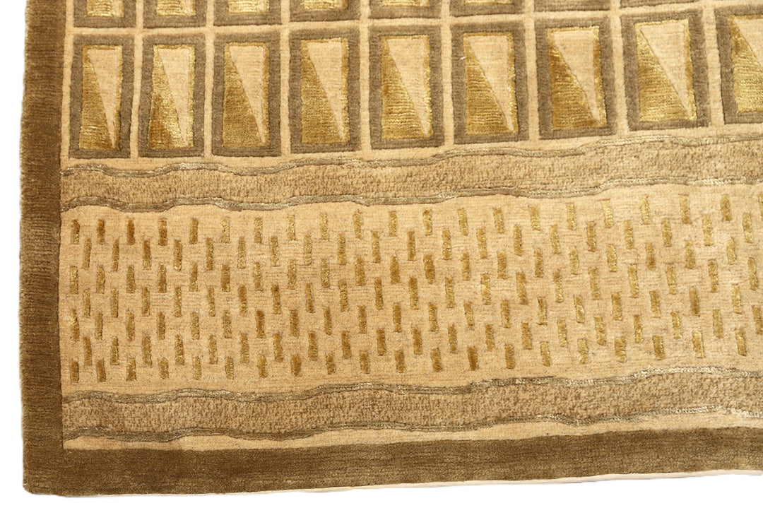 6x9 hand-knotted modern Tibetan wool and silk linear rug in gold and green featuring a plush cut pile with hand-carved geometric lines