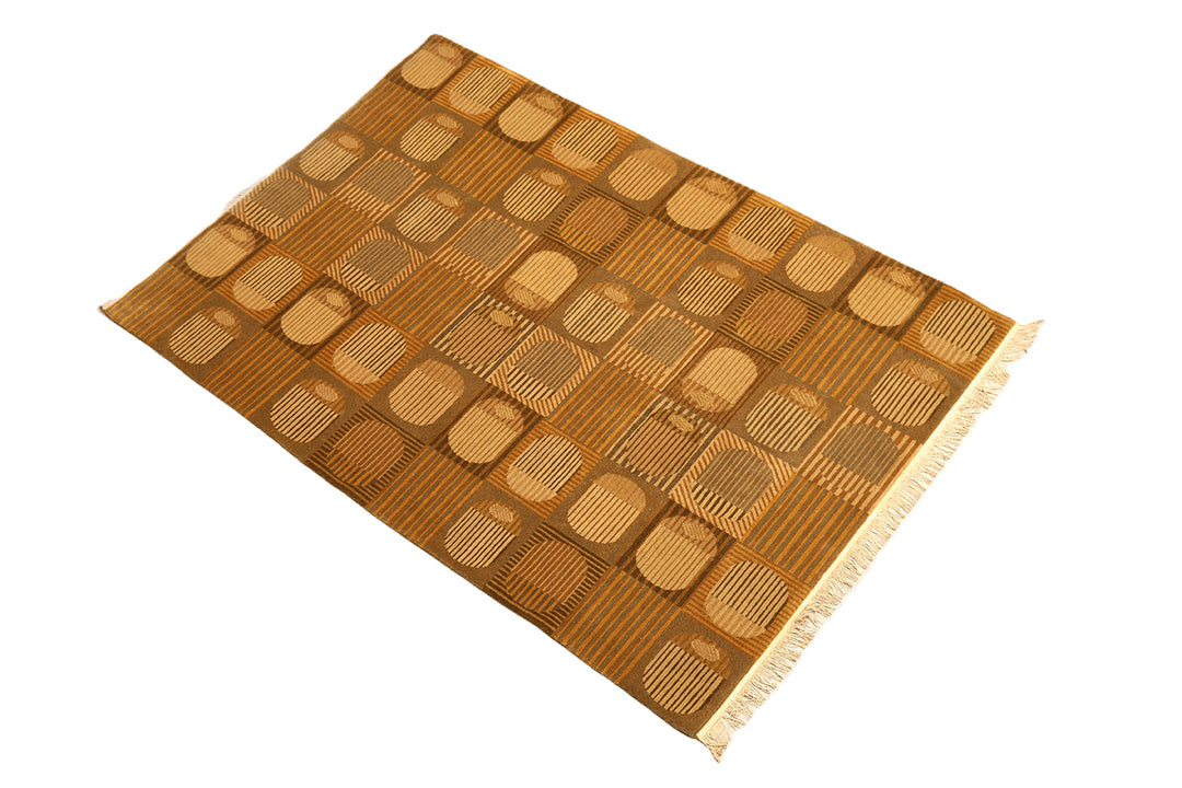6x9 hand-knotted modern Tibetan wool and silk geometric rug in gold and green featuring a textured cut and loop pile