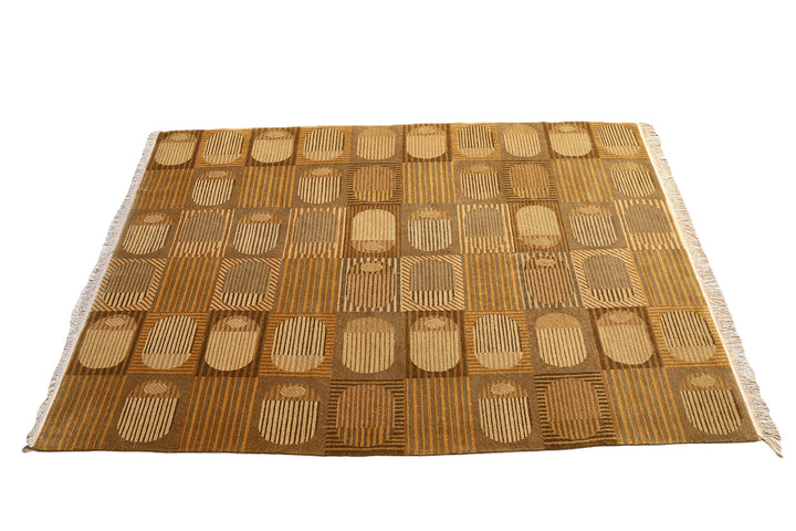 6x9 hand-knotted modern Tibetan wool and silk geometric rug in gold and green featuring a textured cut and loop pile