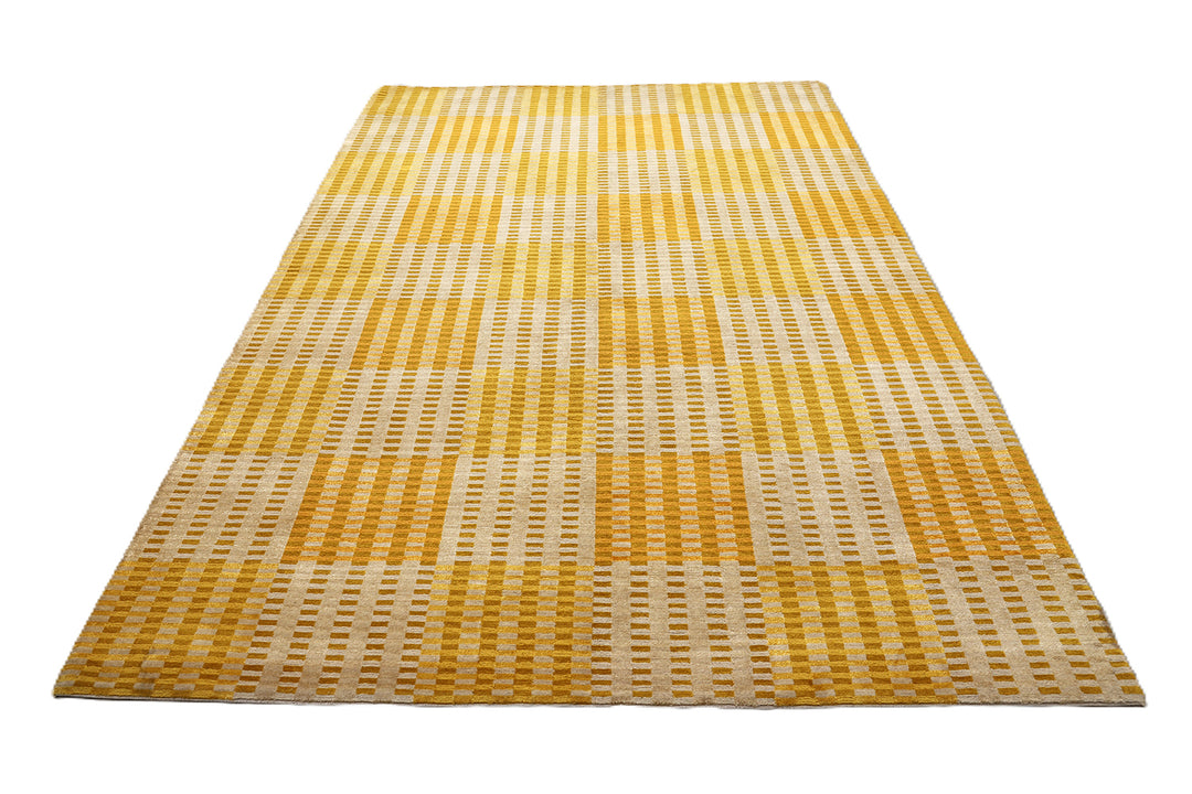 6x9 hand-knotted modern Tibetan wool and silk geometric rug in gold, yellow, orange, and brown with a textured cut and loop pile