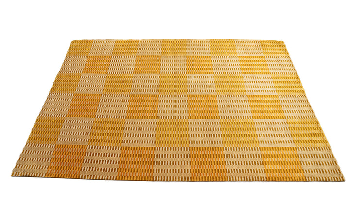 6x9 hand-knotted modern Tibetan wool and silk geometric rug in gold, yellow, orange, and brown with a textured cut and loop pile