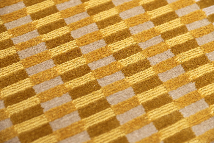 6x9 hand-knotted modern Tibetan wool and silk geometric rug in gold, yellow, orange, and brown with a textured cut and loop pile