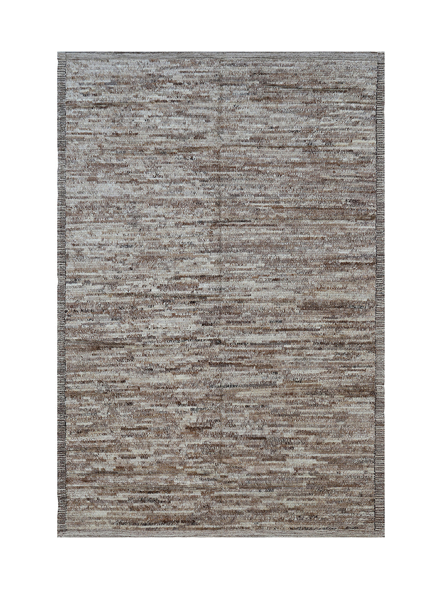 Textured area rug with a neutral color palette on a white background