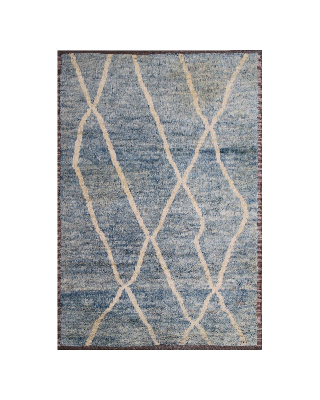 Hand-crafted 9'1" x 6'1" Moroccan-style blue and cream shag wool area rug featuring crisp white stripes and a warm brown border.