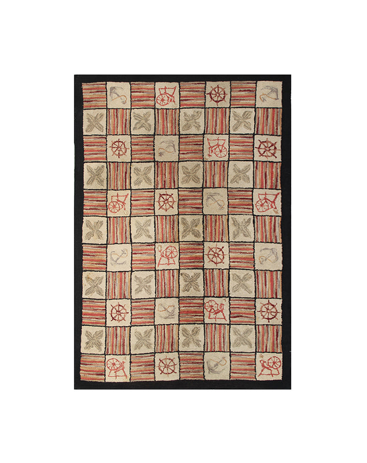 Patterned rug with geometric design on a white background