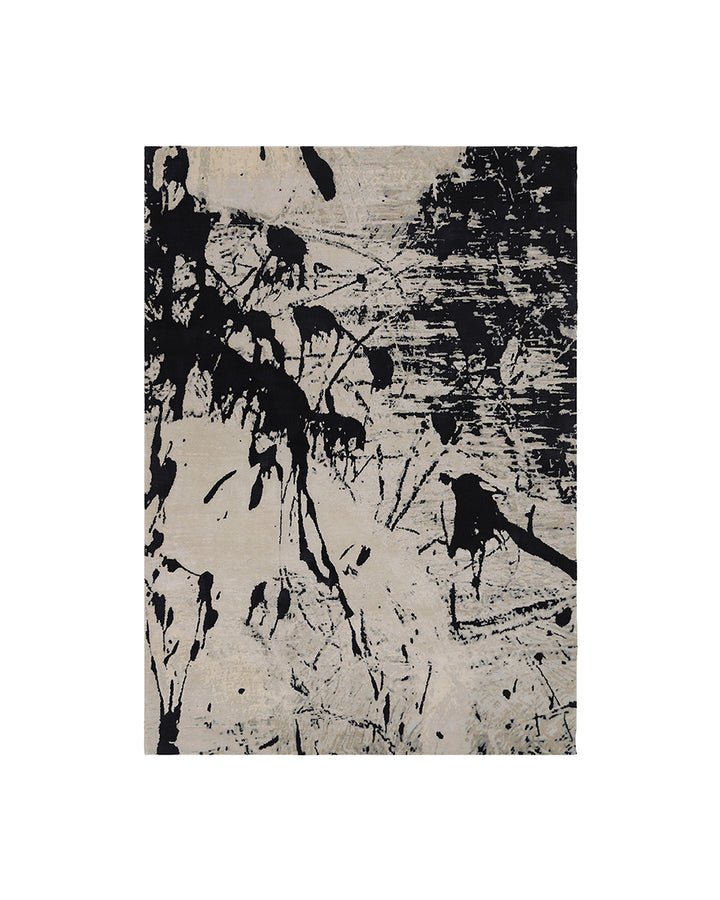 Abstract art piece with black and white patterns on a textured background