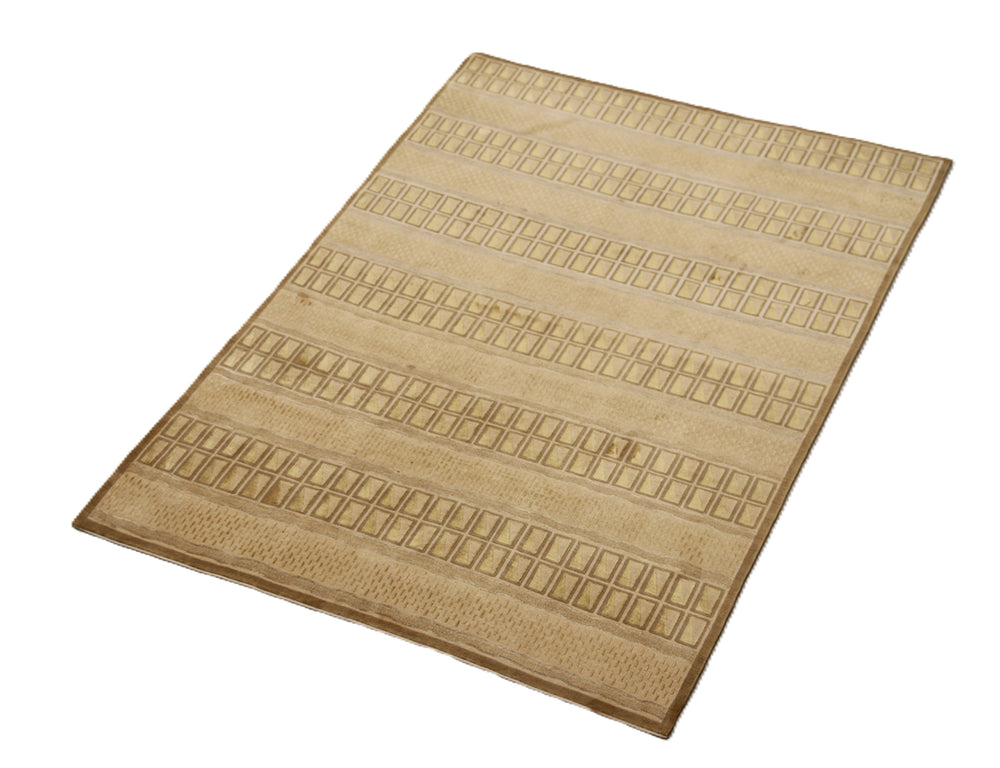 6x9 hand-knotted modern Tibetan wool and silk linear rug in gold and green featuring a plush cut pile with hand-carved geometric lines