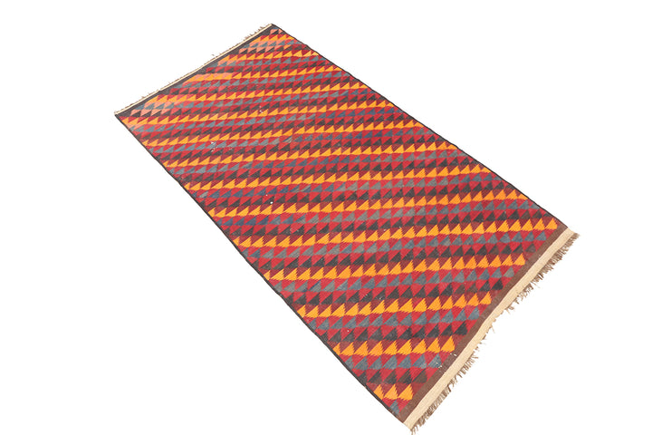 Rectangular rug with geometric pattern on a white background