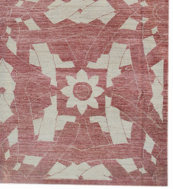 Abstract patterned rug with red and beige colors