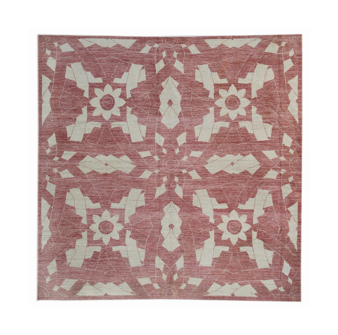 Patterned rug with geometric design on a terracotta background