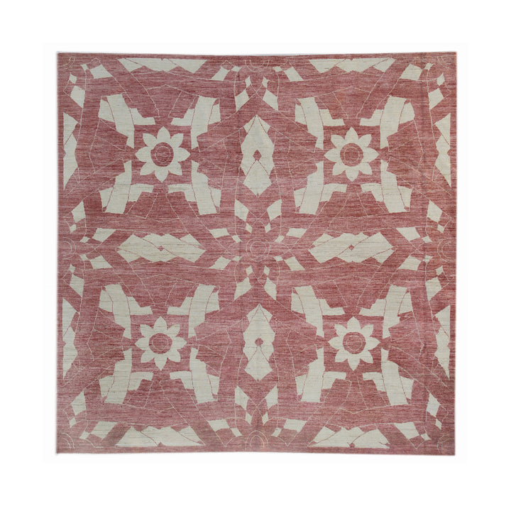 Patterned rug with geometric design on a terracotta background
