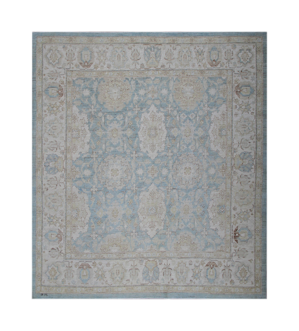 Decorative rug with intricate patterns on a blue background