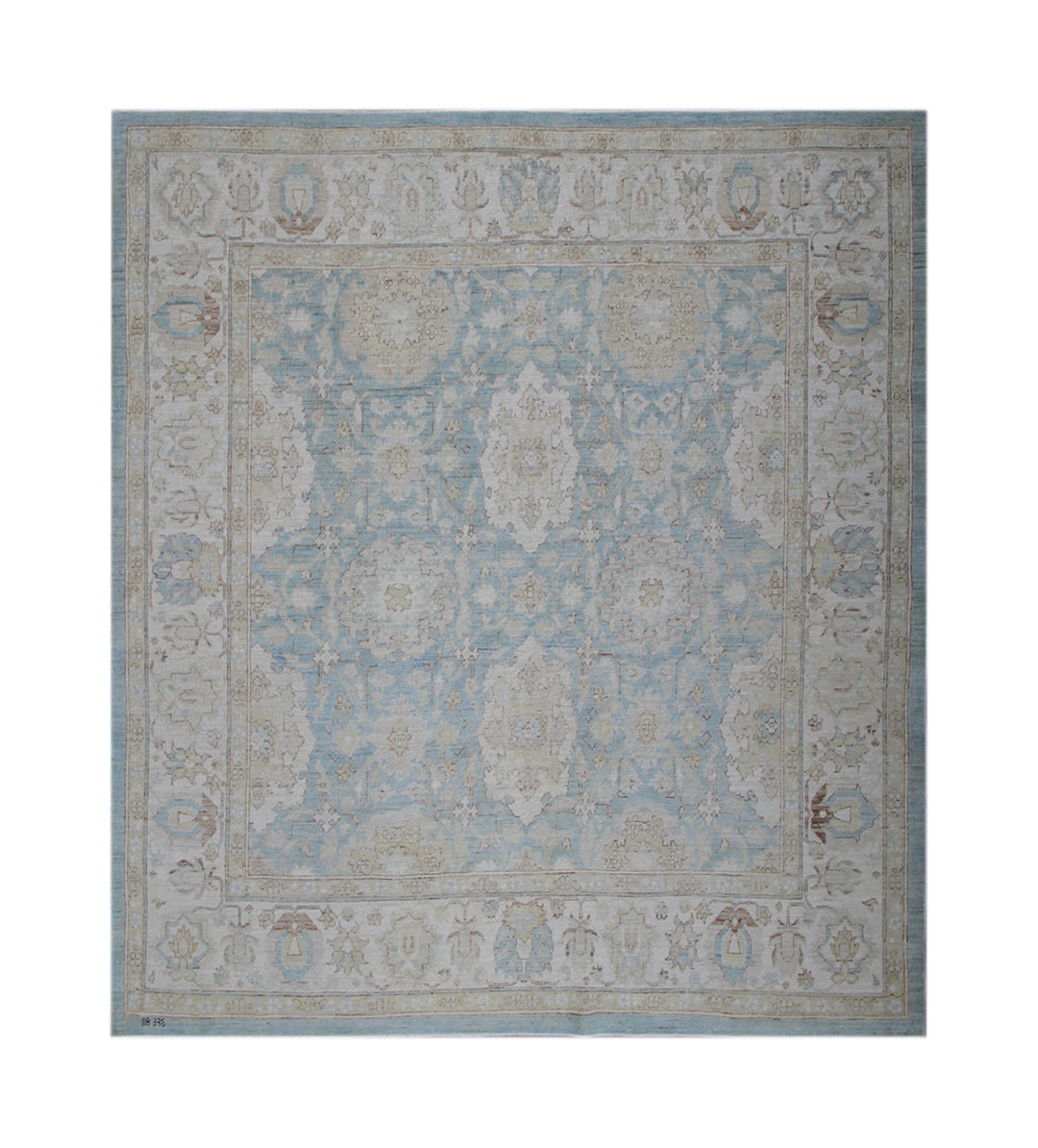 Decorative rug with intricate patterns on a blue background