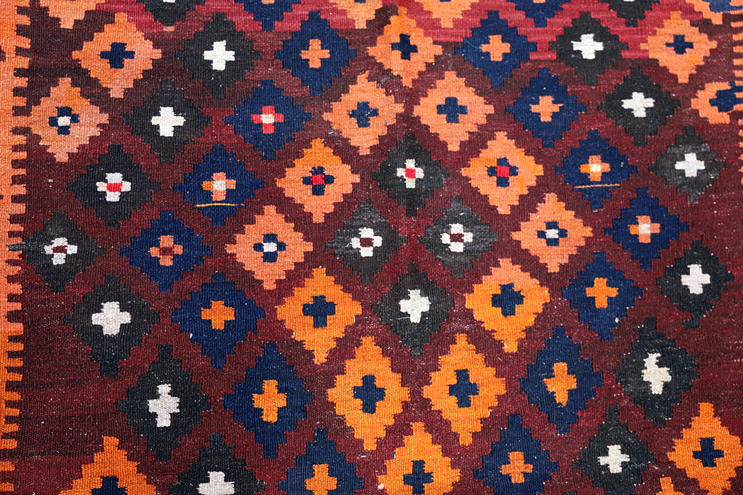 Close-up of a patterned rug with geometric design