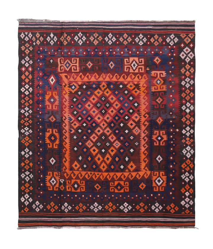Decorative rug with intricate patterns on a white background