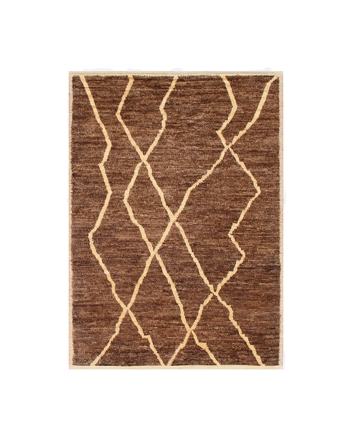 Brown rug with geometric pattern on a white background