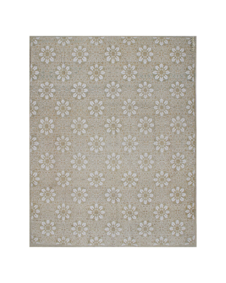A rectangular area rug with a repeating floral medallion pattern in beige, cream, and light gray tones, shown flat against a white background.