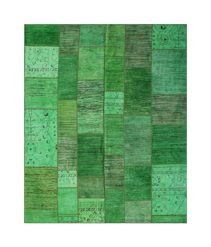 Green patchwork rug with various shades on a white background