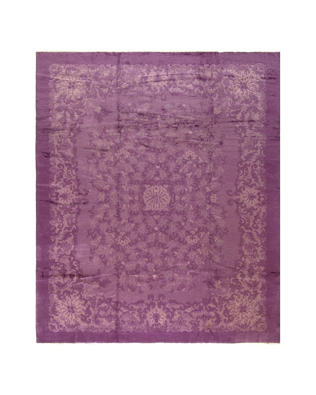 Purple patterned rug on a white background