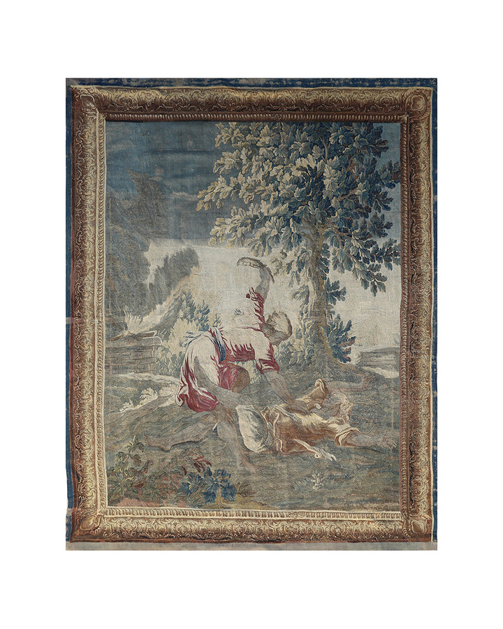 Decorative tapestry with a hunting scene and ornate frame on a white background