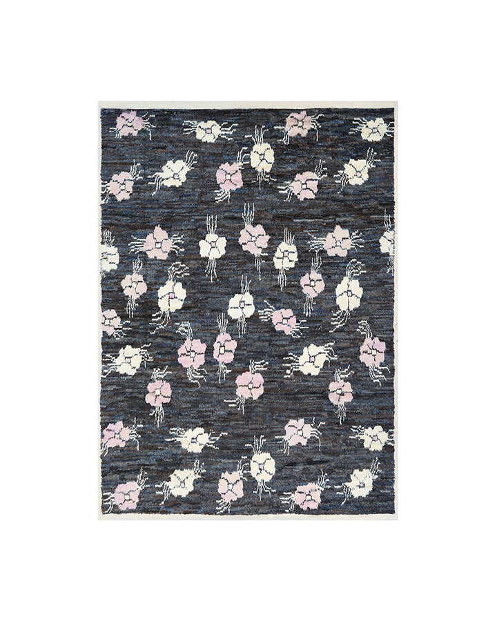 Floral patterned rug on a white background