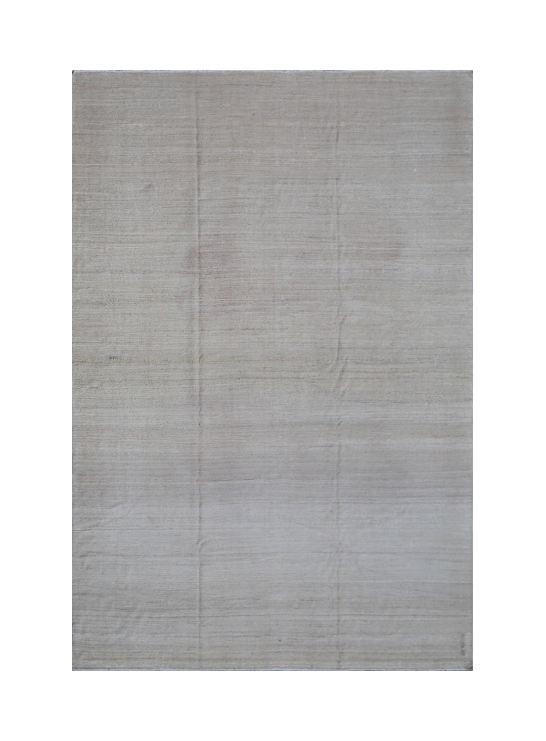 Gray rug with a subtle pattern on a white background