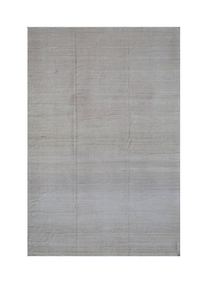 Gray rug with a subtle pattern on a white background