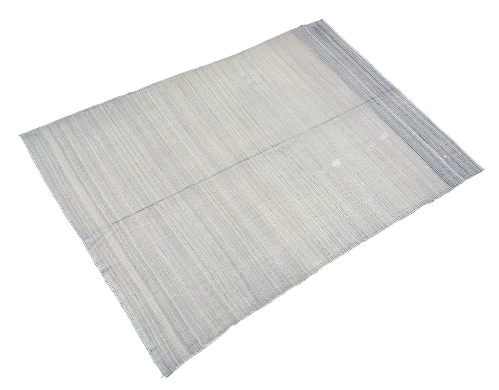 Rectangular rug with a striped pattern on a white background