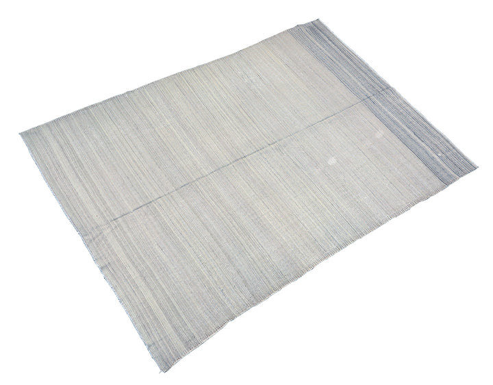 Rectangular rug with a striped pattern on a white background