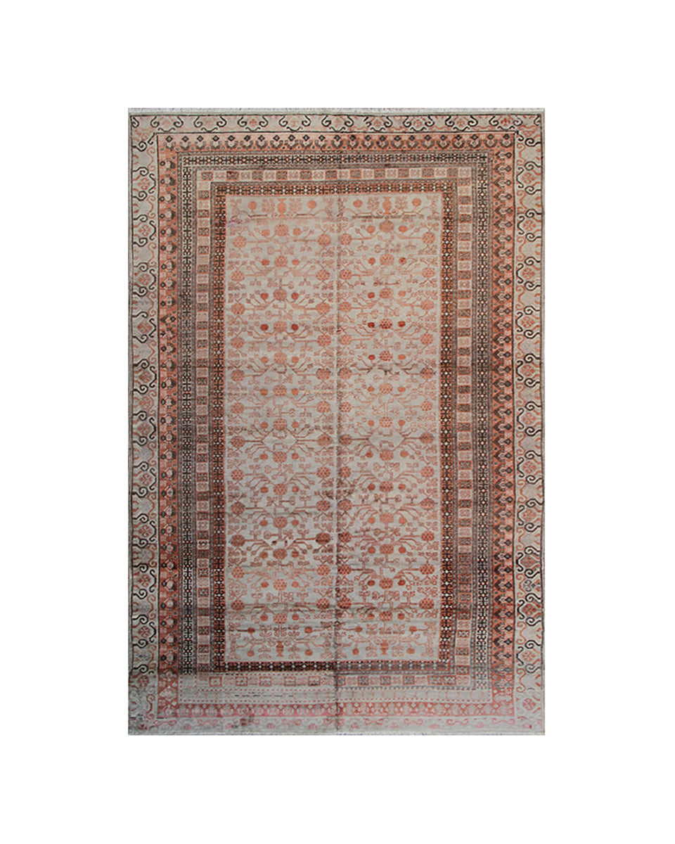 Decorative rug with intricate patterns on a white background